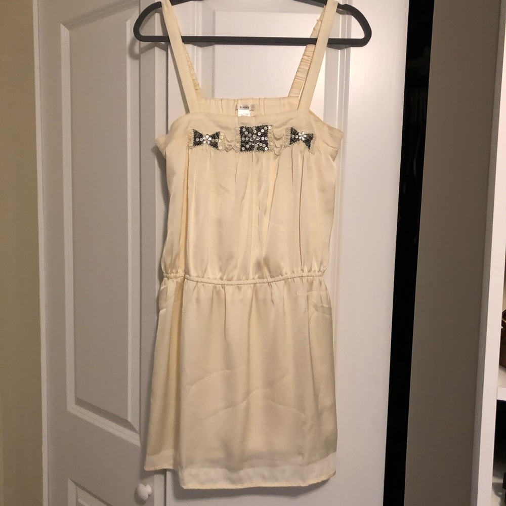 Cream colored dress with beaded detail